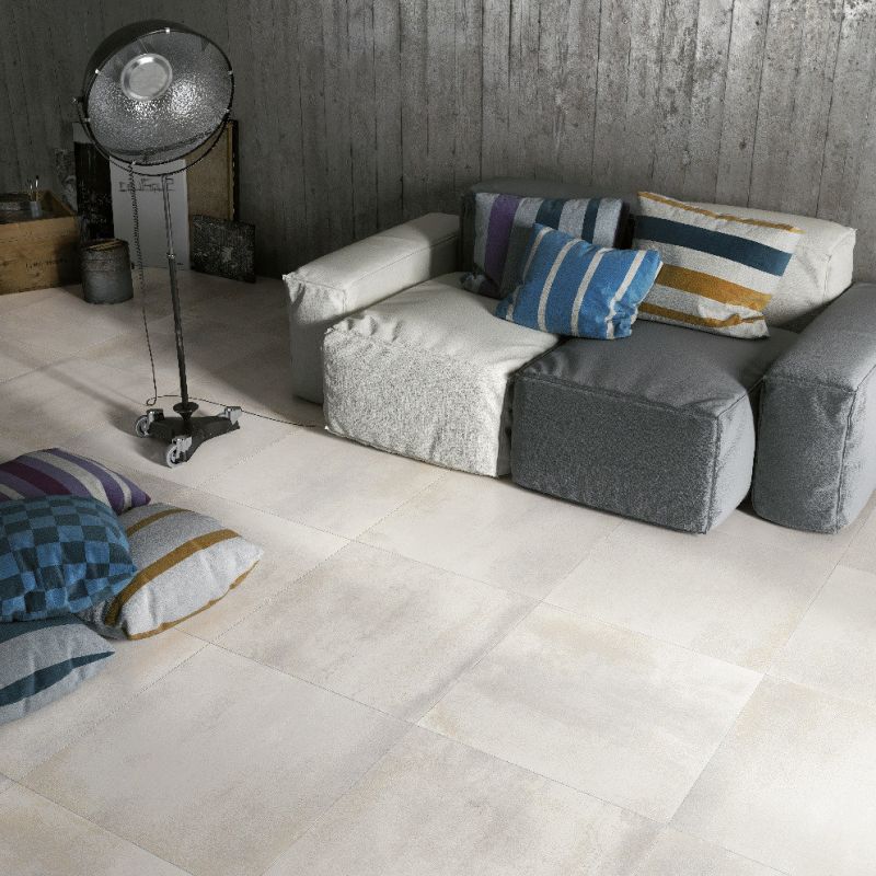 Zeitlose, helle Bodenfliesen in Betonoptik für stilvolle Innenräume.